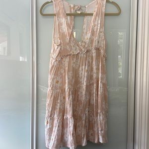 Pink and white dress perfect for summer or bean wear.